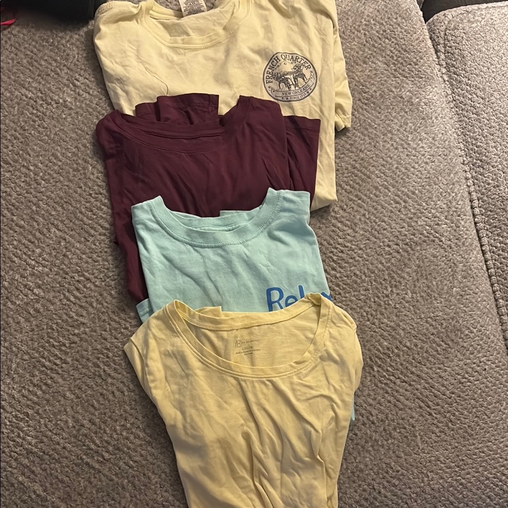 Assorted T-Shirts in Yellow, Burgundy, and Light Blue